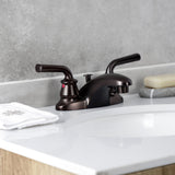 Restoration Two-Handle 3-Hole Deck Mount 4" Centerset Bathroom Faucet with Plastic Pop-Up