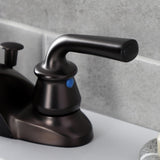 Restoration Two-Handle 3-Hole Deck Mount 4" Centerset Bathroom Faucet with Plastic Pop-Up