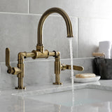 Whitaker Two-Handle 2-Hole Deck Mount Bridge Bathroom Faucet with Push Pop-Up Drain