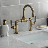 Whitaker Two-Handle 2-Hole Deck Mount Bridge Bathroom Faucet with Push Pop-Up Drain