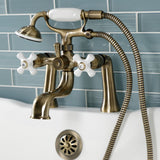 Kingston Three-Handle 2-Hole Deck Mount Clawfoot Tub Faucet with Hand Shower