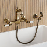 Heritage Double-Handle 3-Hole Wall-Mount Bridge Kitchen Faucet with Brass Sprayer