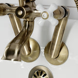 Kingston Three-Handle 2-Hole Tub Wall Mount Clawfoot Tub Faucet with Hand Shower