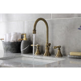 Tudor Two-Handle 3-Hole Deck Mount Widespread Bathroom Faucet with Brass Pop-Up Drain