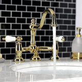 Restoration Two-Handle 3-Hole Deck Mount Bridge Bathroom Faucet with Brass Pop-Up