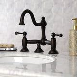 Restoration Two-Handle 3-Hole Deck Mount Bridge Bathroom Faucet with Brass Pop-Up