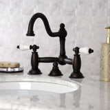 Restoration Two-Handle 3-Hole Deck Mount Bridge Bathroom Faucet with Brass Pop-Up