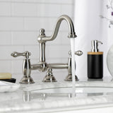 Restoration Two-Handle 3-Hole Deck Mount Bridge Bathroom Faucet with Brass Pop-Up