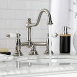 Restoration Two-Handle 3-Hole Deck Mount Bridge Bathroom Faucet with Brass Pop-Up