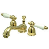 Restoration Two-Handle 3-Hole Deck Mount Mini-Widespread Bathroom Faucet with Brass Pop-Up