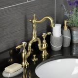 Tudor Two-Handle 3-Hole Deck Mount Bridge Bathroom Faucet with Brass Pop-Up