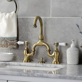 Bel-Air Two-Handle 3-Hole Deck Mount Bridge Bathroom Faucet with Brass Pop-Up