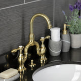 Tudor Two-Handle 3-Hole Deck Mount Bridge Bathroom Faucet with Brass Pop-Up