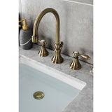 Tudor Two-Handle 3-Hole Deck Mount Widespread Bathroom Faucet with Brass Pop-Up Drain